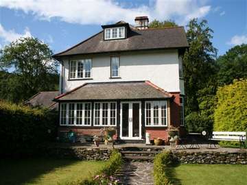 HESWALL . WIRRAL : Installation of Evolution storm window in the Tudor range. Evolution windows Cheshire 